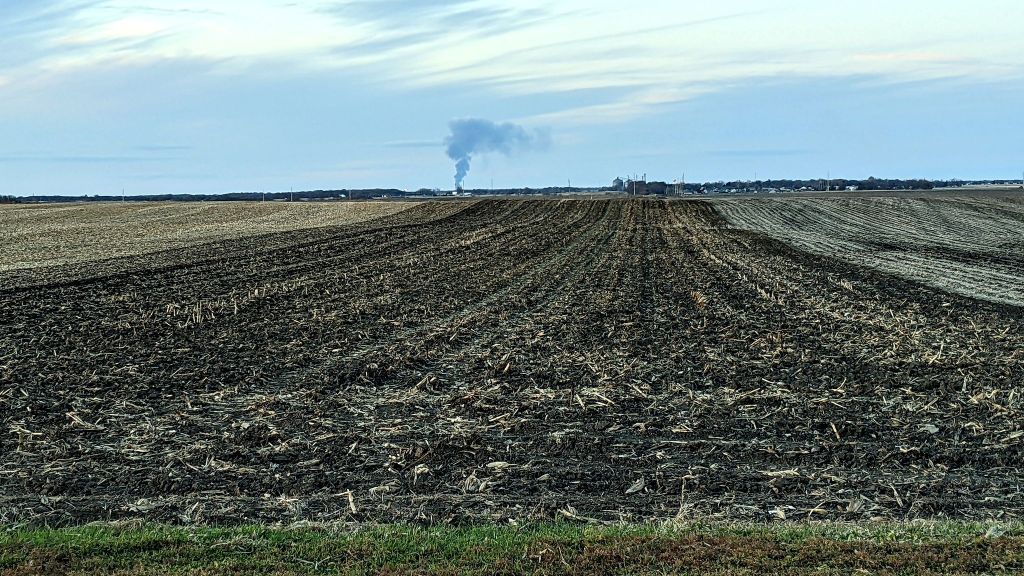 Prairie setting about a hundred feet from the snowdrift photos below. The fields are plowed and soil is visible.